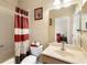 Clean bathroom with shower/tub combo and updated vanity at 590 Michigan Estates Cir, St Cloud, FL 34769
