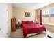 Primary bedroom with king-size bed and plenty of closet space at 590 Michigan Estates Cir, St Cloud, FL 34769