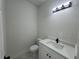 Clean bathroom with white vanity and quartz countertop at 702 Marion Oaks Manor, Ocala, FL 34473