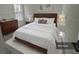 Spacious bedroom with a king-size bed and modern dresser at 702 Marion Oaks Manor, Ocala, FL 34473