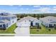 Charming single-story home with a well-manicured lawn and a two car garage at 7149 Dilly Lake Ave, Groveland, FL 34736