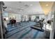Well-equipped fitness center with treadmills, weights, and various exercise machines for resident workouts at 7149 Dilly Lake Ave, Groveland, FL 34736