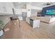 Open concept kitchen with island and stainless steel appliances at 7149 Dilly Lake Ave, Groveland, FL 34736