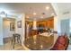 Modern kitchen with stainless steel appliances and granite countertops at 7609 Heritage Crossing Way # 201, Reunion, FL 34747