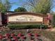 Beautiful Valencia Hills neighborhood sign surrounded by bright foliage at 7839 Murcott Cir, Orlando, FL 32835