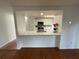 View of the updated kitchen featuring a breakfast bar overlooking the living area at 7839 Murcott Cir, Orlando, FL 32835