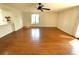 Spacious living room featuring wood floors and plenty of natural light at 7839 Murcott Cir, Orlando, FL 32835