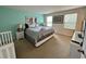 Main bedroom with king-size bed and calming decor at 840 Las Fuentes Dr, Kissimmee, FL 34746