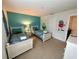 ' bedroom with twin beds and Monster's Inc. wall art at 840 Las Fuentes Dr, Kissimmee, FL 34746