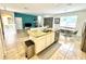 Kitchen island with sink and stainless steel appliances at 840 Las Fuentes Dr, Kissimmee, FL 34746