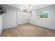 Spacious bedroom with carpet, walk-in closet, and chandelier at 847 Lake Charm Dr, Oviedo, FL 32765