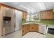 Galley-style kitchen with stainless steel appliances at 847 Lake Charm Dr, Oviedo, FL 32765