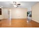 View of a spacious living area with hardwood floors at 847 Lake Charm Dr, Oviedo, FL 32765