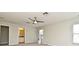 Bedroom featuring ceiling fan and attached bathroom with double sinks at 890 Moonluster Dr, Casselberry, FL 32707