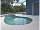 Inviting screened pool with spa, offering a private outdoor oasis at 890 Moonluster Dr, Casselberry, FL 32707