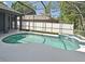Beautiful screened pool with a spa and a view of the backyard at 890 Moonluster Dr, Casselberry, FL 32707
