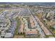 Aerial view of community, showcasing home location and neighborhood at 9043 Dogleg Dr, Davenport, FL 33896