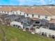 Aerial view of townhouses with private pools and screened enclosures at 9043 Dogleg Dr, Davenport, FL 33896