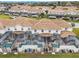 Aerial view of townhouses with private pools and screened enclosures at 9043 Dogleg Dr, Davenport, FL 33896