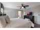 King-size bed, en-suite bathroom, and a dresser at 9043 Dogleg Dr, Davenport, FL 33896