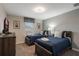 Two twin beds, wood frame, and a TV at 9043 Dogleg Dr, Davenport, FL 33896