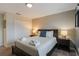 Cozy bedroom with double bed, nightstands, and ample closet space at 9043 Dogleg Dr, Davenport, FL 33896