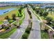 Entrance to ChampionsGate community with landscaping at 9043 Dogleg Dr, Davenport, FL 33896