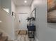 Bright and airy entryway with tile floors and staircase at 9043 Dogleg Dr, Davenport, FL 33896