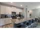 Modern kitchen with stainless steel appliances and granite countertops at 9043 Dogleg Dr, Davenport, FL 33896