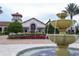 Community center with fountain and landscaping at 10432 Austrina Oak Loop, Winter Garden, FL 34787