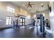 Spacious fitness center with modern equipment and large windows at 10432 Austrina Oak Loop, Winter Garden, FL 34787