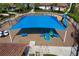 Shaded playground with slides, climbing structures, and play area at 10432 Austrina Oak Loop, Winter Garden, FL 34787