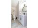 Modern powder room with patterned tile floor at 10483 Kristen Park Dr, Orlando, FL 32832