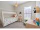 bedroom with teepee bed and dinosaur theme at 10483 Kristen Park Dr, Orlando, FL 32832
