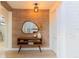 Inviting entryway with wood-paneled feature wall at 10483 Kristen Park Dr, Orlando, FL 32832