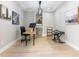 Home office with hardwood floors, desk, and inspiring artwork at 10483 Kristen Park Dr, Orlando, FL 32832