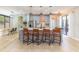 Modern kitchen with island, stainless steel appliances, and hardwood floors at 10483 Kristen Park Dr, Orlando, FL 32832