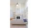 Living room showcasing a fireplace and large windows at 10483 Kristen Park Dr, Orlando, FL 32832