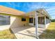 Covered patio with screened enclosure and ceiling fan at 10720 Fallow Trl, Orlando, FL 32817