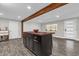 Open concept kitchen and living area with a butcher block island at 1098 S Oleander St, Longwood, FL 32750