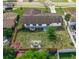 Backyard of home with pergola and large grassy area at 1203 Marlowe Ave, Orlando, FL 32809