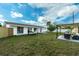 Large backyard with a pergola, hammock, and plenty of space for entertaining at 1203 Marlowe Ave, Orlando, FL 32809