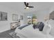 Bedroom with a queen-size bed, window, and access to backyard at 1203 Marlowe Ave, Orlando, FL 32809