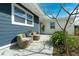 Patio with wicker furniture, providing a relaxing outdoor space at 1203 Marlowe Ave, Orlando, FL 32809