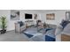 Bright living room features stylish furniture and a large area rug at 1203 Marlowe Ave, Orlando, FL 32809