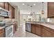 Modern kitchen with stainless steel appliances and granite countertops at 1208 Bella Vista Cir, Longwood, FL 32779