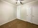 Bedroom with neutral decor and ample closet space at 1214 Romani Ave # 10240, Davenport, FL 33896