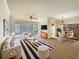 Spacious living room with ample natural light and stylish furnishings at 1214 Romani Ave # 10240, Davenport, FL 33896