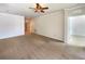 Spacious living room featuring neutral walls and carpeting at 1214 Romani Ave # 10240, Davenport, FL 33896