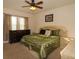 Spacious bedroom with king-size bed and dresser at 1337 Glenleigh Dr, Ocoee, FL 34761